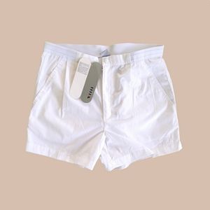 Men's FILA Stretch Button White Tennis Shorts Size 36. BRAND NEW NWT